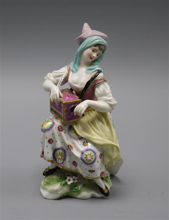 A Chelsea? porcelain figure of a lady Hurdy Gurdy player height 15cm